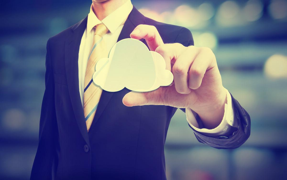 Man In Suit Holding Cloud Computing Image Concept